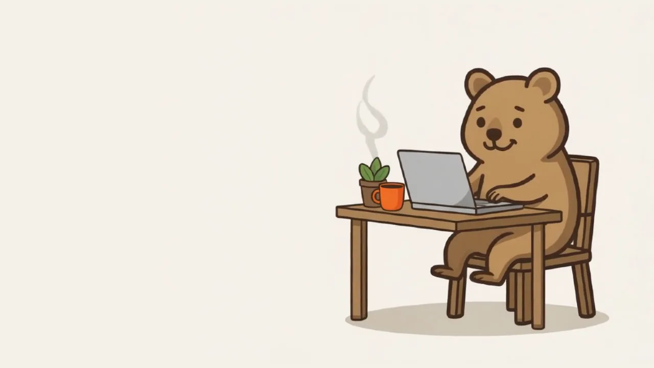 The quokka mascot coding on a laptop at a wooden desk, next to an orange mug and a small plant